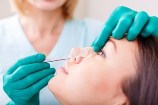 gallery/doctor-checking-woman-s-face-eyelid-before-plastic-surgery-blepharoplasty_124865-1059